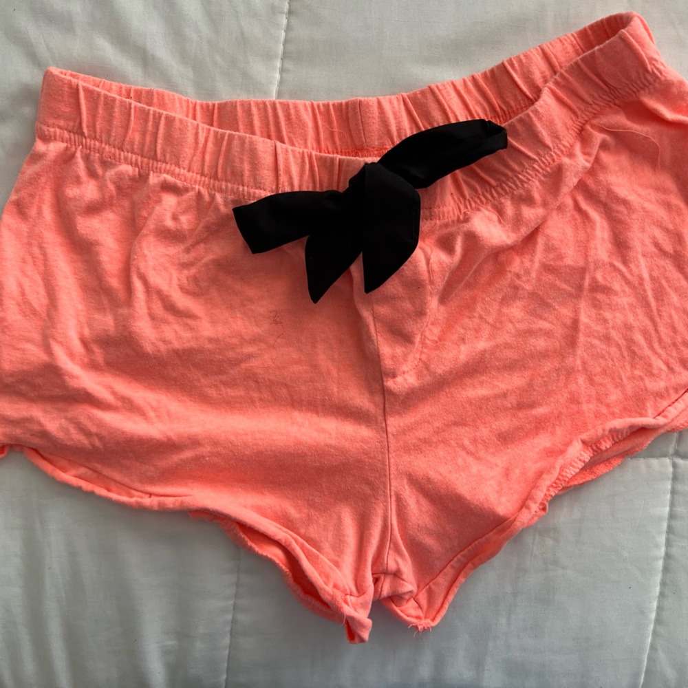 peach shorts with black bow